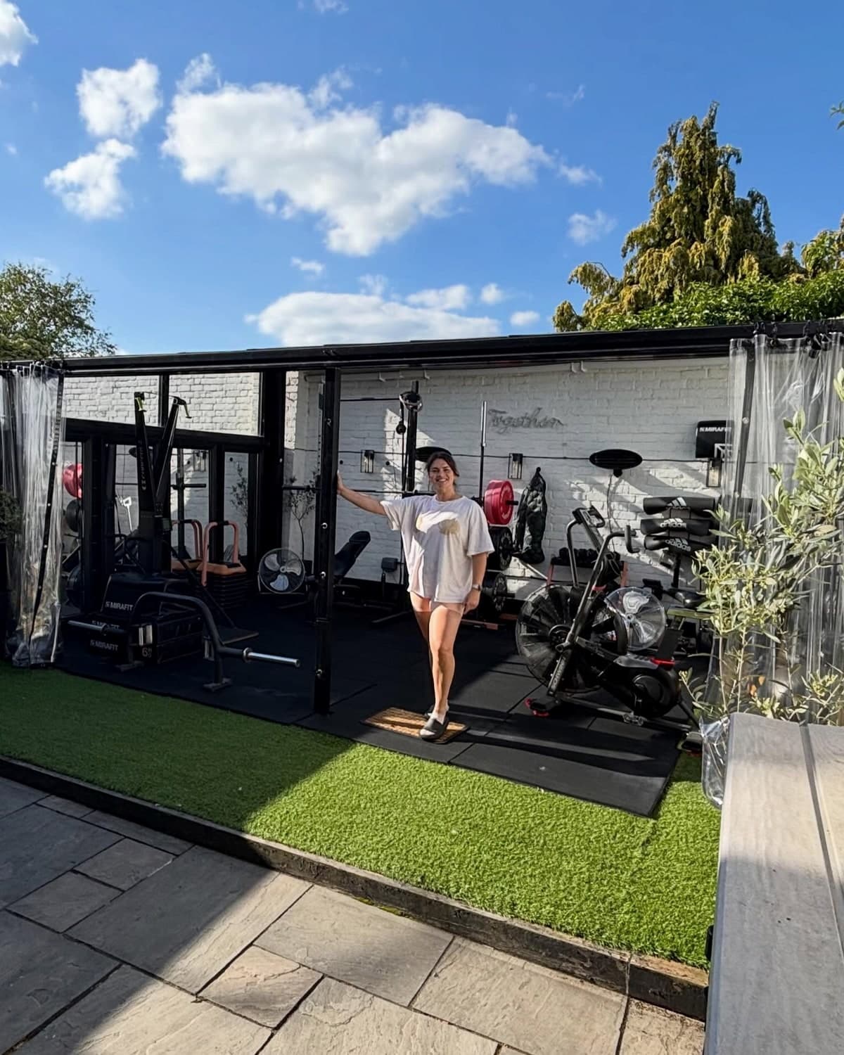 Lucy taking a selfie inside the bright, fully equipped Rose Yard Studio